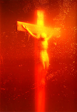 Piss Christ is a 1987 photograph by the American artist and photographer Andres Serrano. It depicts a small plastic crucifix submerged in a glass of the artist's urine. The piece was a winner of the Southeastern Center for Contemporary Art's "Awards in the Visual Arts" competition,[1] which was sponsored in part by the National Endowment for the Arts, a United States Government agency that offers support and funding for artistic projects. A print of the photograph was damaged using a screwdriver or icepick on April 17, 2011 while on exhibit in Avignon, France.  