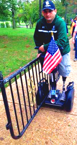 Disableded Vet moves heavy "Barricade" from his WWII Memorial. 