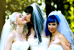 "Three Massachusetts lesbians claim they got 'married' to each other and are now expecting their first child.  Doll, Kitten and Brynn Young exchanged vows in a commitment ceremony last August, with all three brides wearing white and traditional wedding veils.  'I cried watching Doll and Kitten walk down the aisle toward me with their dads,' Brynn told The Sun newspaper of London. 'After we said our vows, Doll and Kitten kissed me first then each other.'” - New York Daily Post  