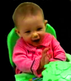 Enjoy the short video of Kaydence at six months.  Don't tell anyone - her mother had no hair at this age and looked like an adorable ET.  