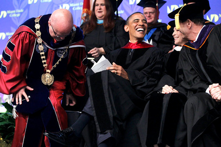 President Barack Obama at the Miami Dade College North and West Campus graduation on April 29, 2011. (AP Photo/Charles Dharapak.)   